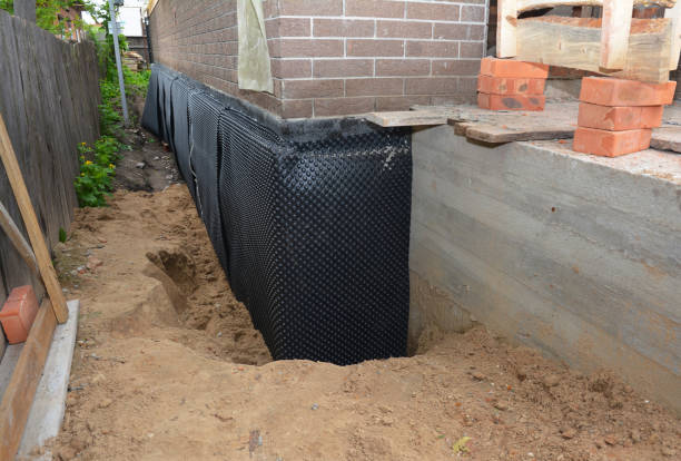 Happy homeowners after waterproofing job in Collinwood